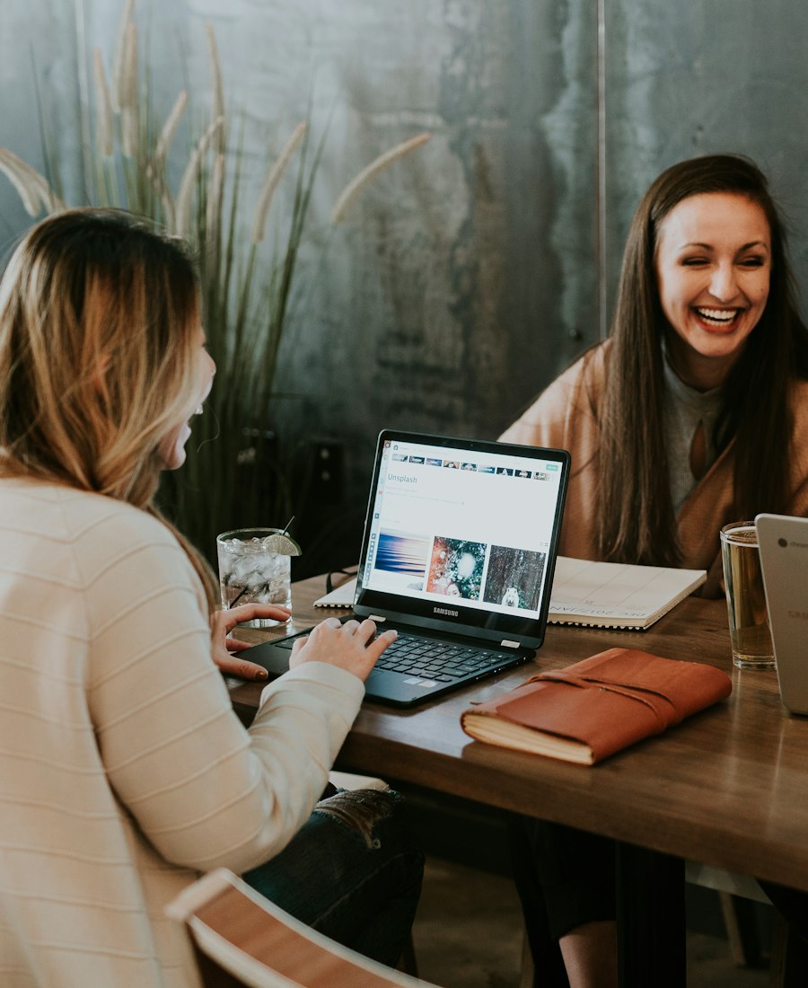 Learners smiling and studying together on a video call